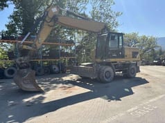 2014 Caterpillar M318D Koparka kołowa