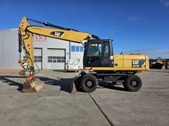 2011 Caterpillar M322D Excavadora de Ruedas