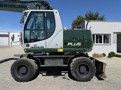 2009 New Holland MH-PLUS Колесный экскаватор