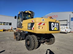 2011 Caterpillar M322D Excavadora de Ruedas