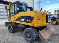 2009 Caterpillar M315D Escavadora de Rodas