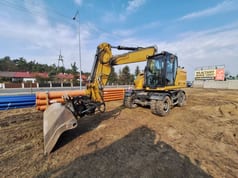 Escavatore su ruote Caterpillar M316 del 2021
