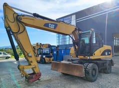 2009 Caterpillar M315D Escavadora de Rodas
