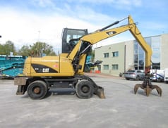 2009 Caterpillar M313D Material Handler
