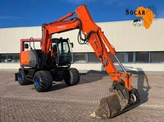 Excavator pe roți Hitachi ZX140W-3, 2011