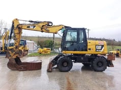 2012 Caterpillar M313D Excavator pe roți