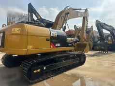 Гусеничный экскаватор Caterpillar 323DL, 2012 года