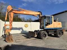 1997 Caterpillar M315 Wheel Excavator