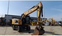 2016 Caterpillar M320F Escavatore a Ruote