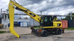 2011 Caterpillar M318D MH Material Handler