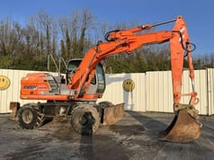 Escavatore Gommato Kobelco E145W del 2004