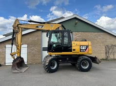 2011 Caterpillar M313D Wheel Excavator