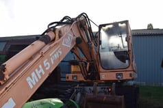 1990 O&K MH 5 Wheel Excavator