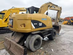 2022 Caterpillar M315D Колісний екскаватор