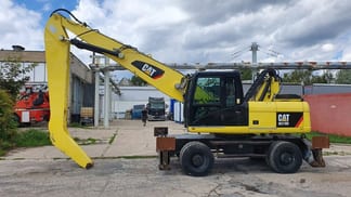 2011 Caterpillar M318D MH Material Handler