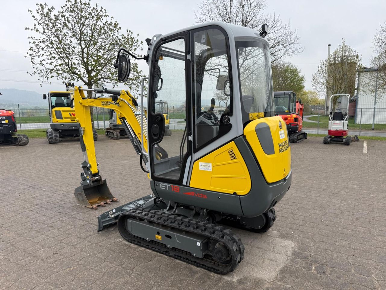 2025 Wacker Neuson ET18 mini excavator, rear three-quarter view