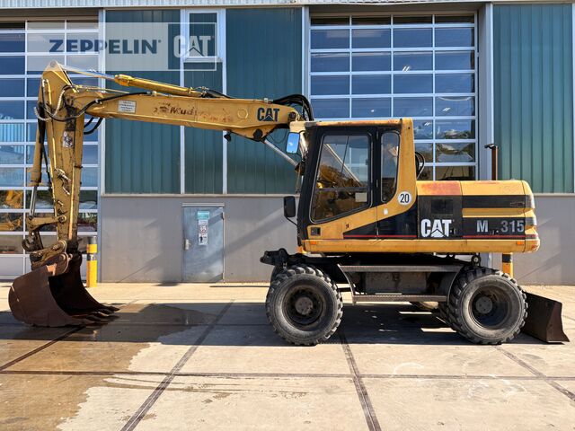 1996 Caterpillar M315 Wheel Excavator