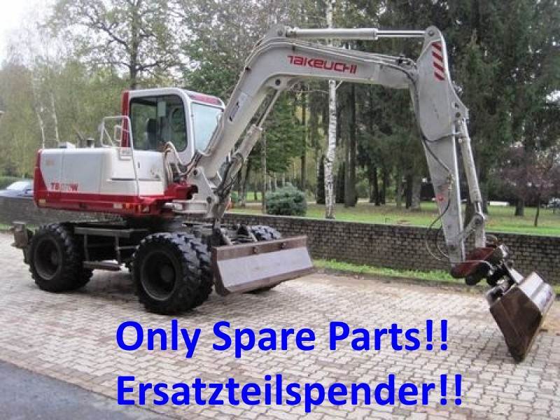2000 Takeuchi TB070W wheel excavator side view