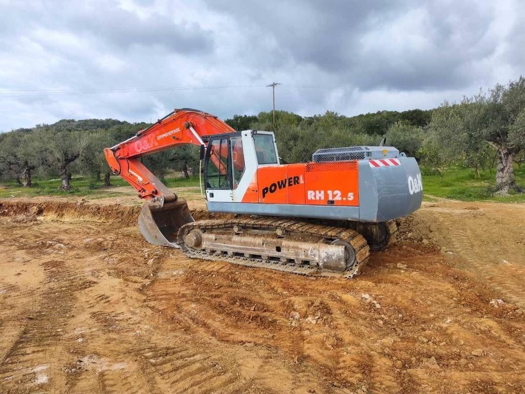 2002 O&K RH 12.5 crawler excavator, rear three-quarter view 2002 O&K RH 12.5 crawler excavator, rear three-quarter view