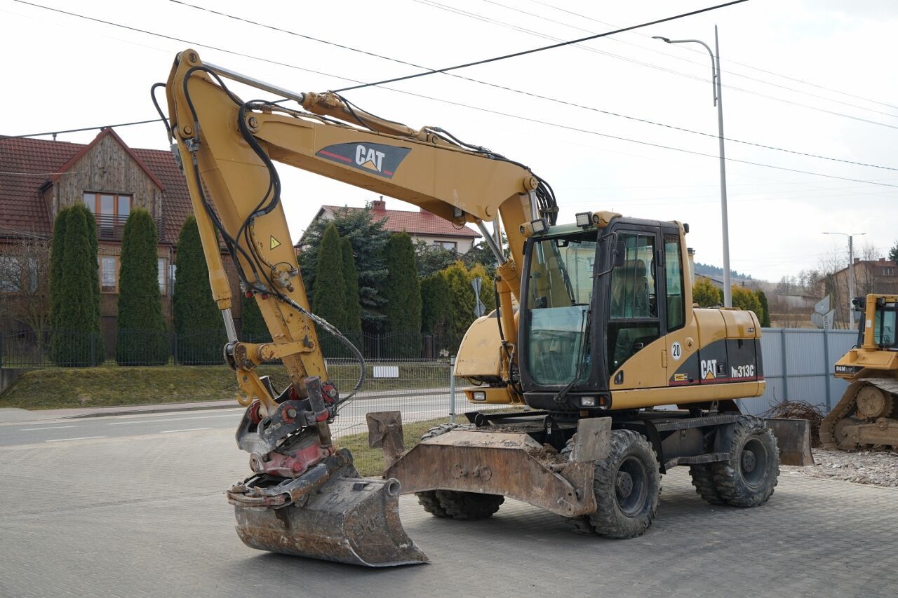 Excavadora sobre Ruedas Caterpillar M313C 2003 Excavadora sobre Ruedas Caterpillar M313C 2003