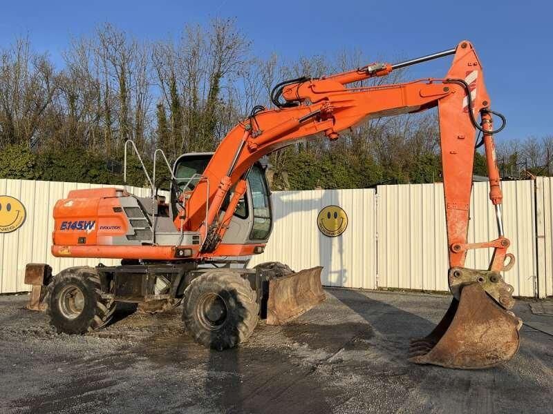 2004 Kobelco E145W wheel excavator, side profile view