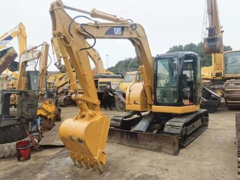 2010 Caterpillar 308C CR mini excavator, rear three-quarter view 2010 Caterpillar 308C CR mini excavator, rear three-quarter view