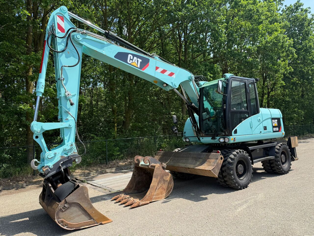 2009 Caterpillar M313D LOW Wheel Excavator 2009 Caterpillar M313D LOW Wheel Excavator