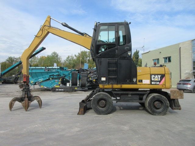 2009 Caterpillar M313D material handler, side view 2009 Caterpillar M313D material handler, side view