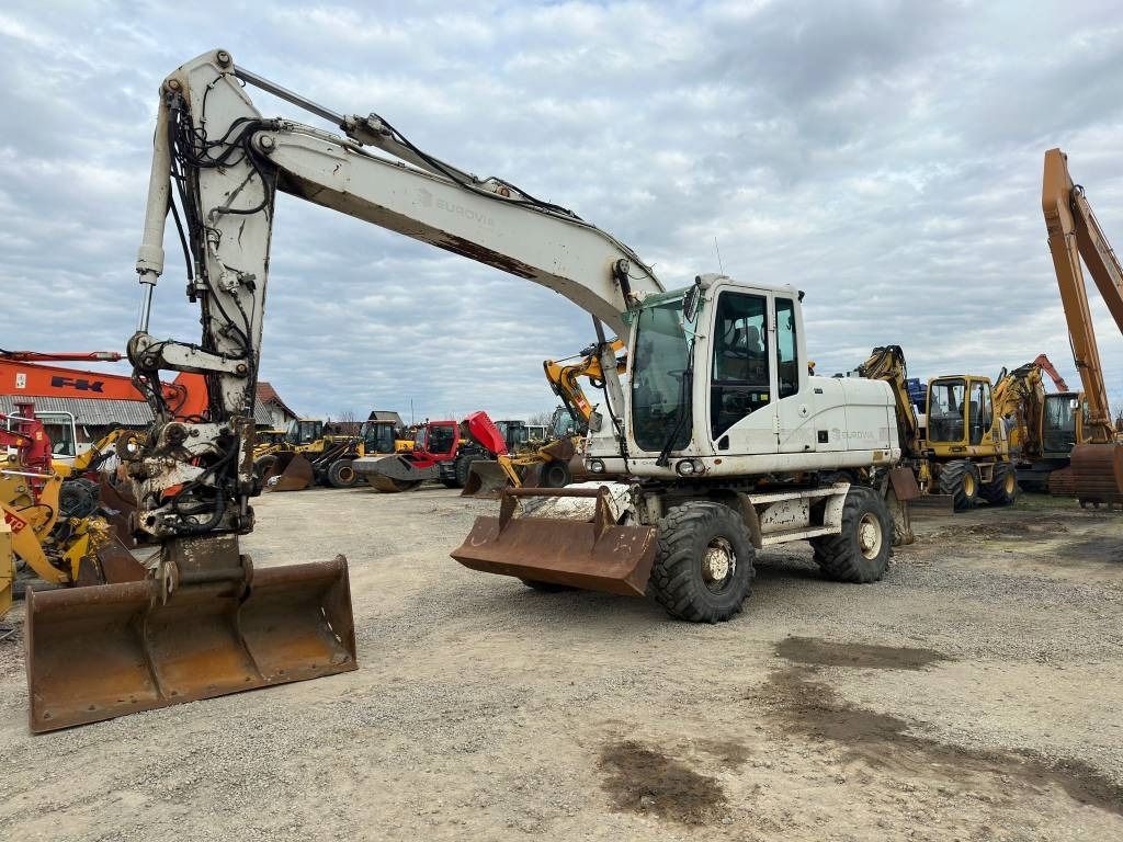 2009 Caterpillar M316D wheel excavator, side view