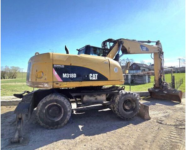 2009 Caterpillar M318D wheel excavator, side profile view 2009 Caterpillar M318D wheel excavator, side profile view