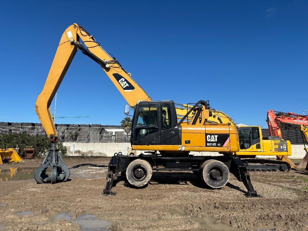 2010 Caterpillar MH318D Material Handler