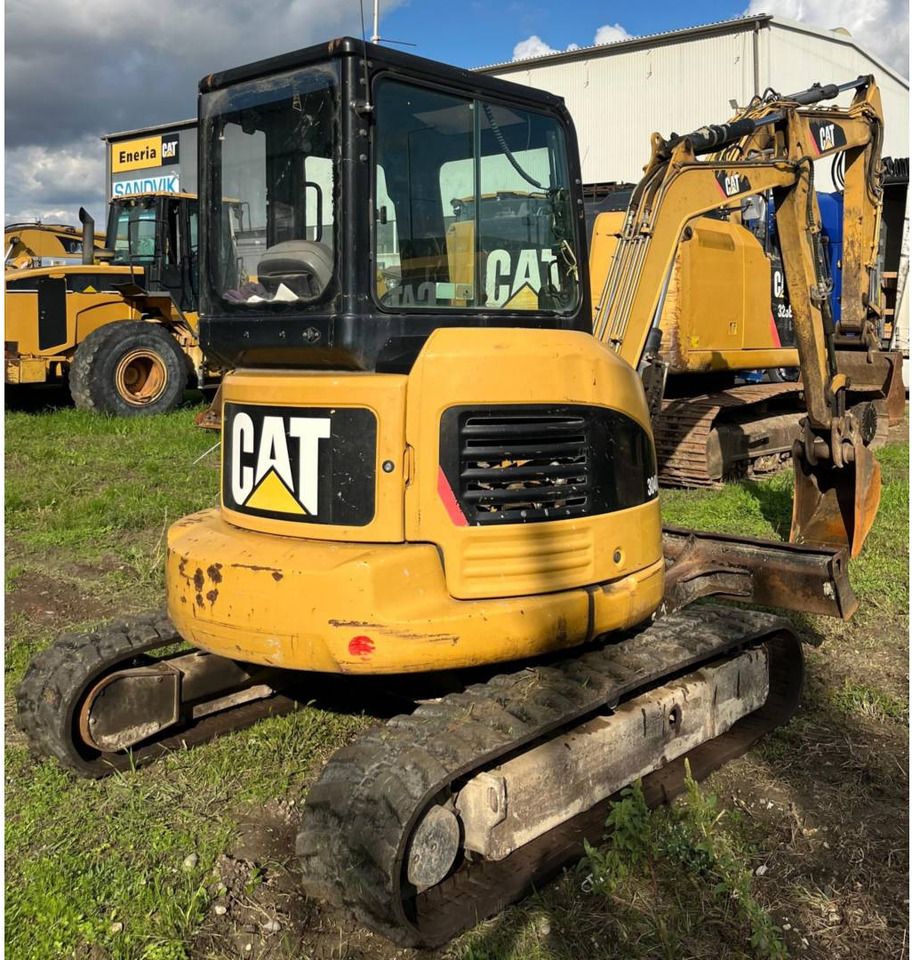 2011 Caterpillar 304DCR crawler excavator, front three-quarter view 2011 Caterpillar 304DCR crawler excavator, front three-quarter view