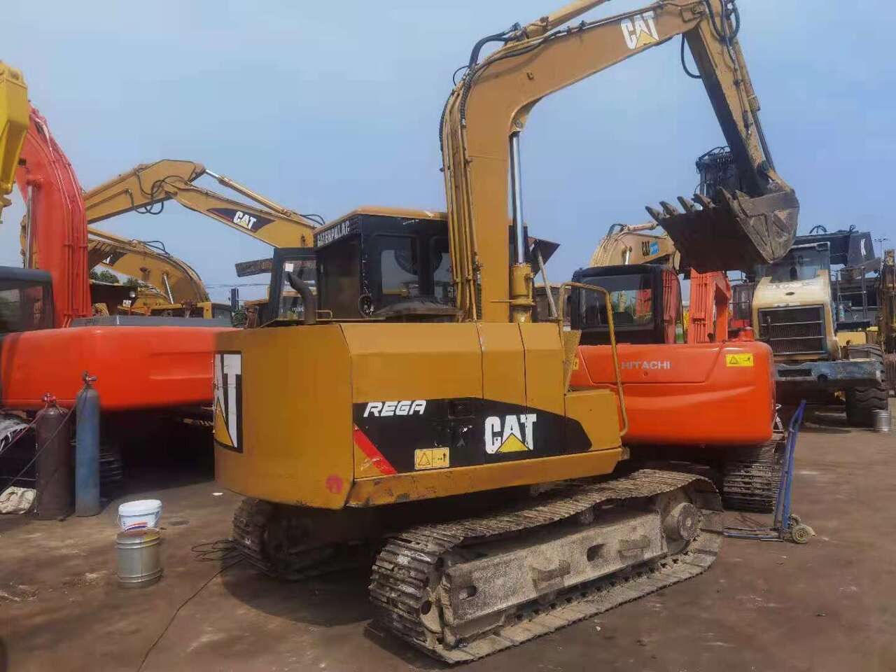 2011 Caterpillar E70B crawler excavator, rear three-quarter view 2011 Caterpillar E70B crawler excavator, rear three-quarter view