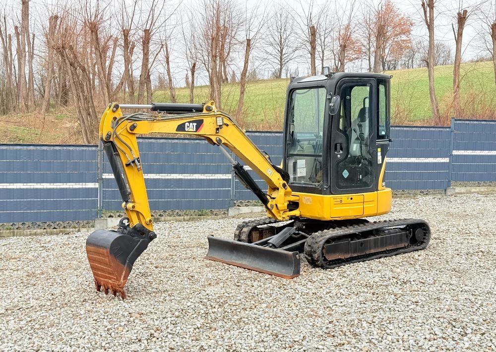 2012 Caterpillar 303.5ECR crawler excavator side view 2012 Caterpillar 303.5ECR crawler excavator side view