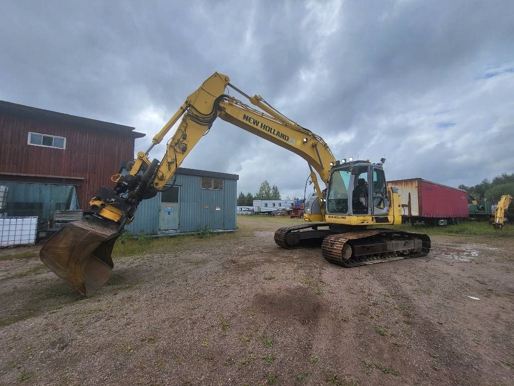 2012 New Holland E235BSR-2 crawler excavator, side view 2012 New Holland E235BSR-2 crawler excavator, side view