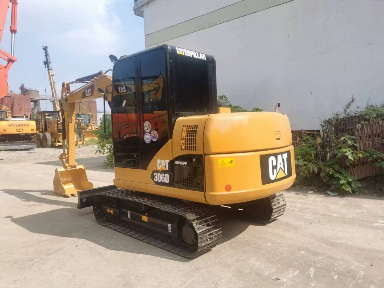2016 Caterpillar 306D mini excavator, side profile view