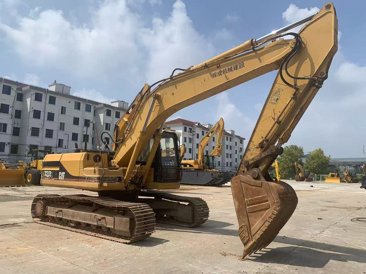 2015 Caterpillar 320BL pelle sur chenilles, vue de profil 2015 Caterpillar 320BL pelle sur chenilles, vue de profil
