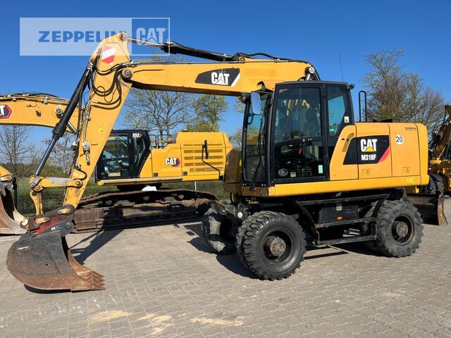2015 Caterpillar M318F wheel excavator side view 2015 Caterpillar M318F wheel excavator side view