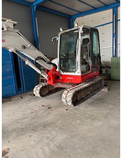 2016 Takeuchi TB260 mini excavator, side view 2016 Takeuchi TB260 mini excavator, side view