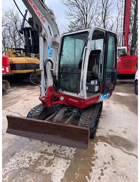 2017 Takeuchi TB240 mini excavator front three-quarter view 2017 Takeuchi TB240 mini excavator front three-quarter view