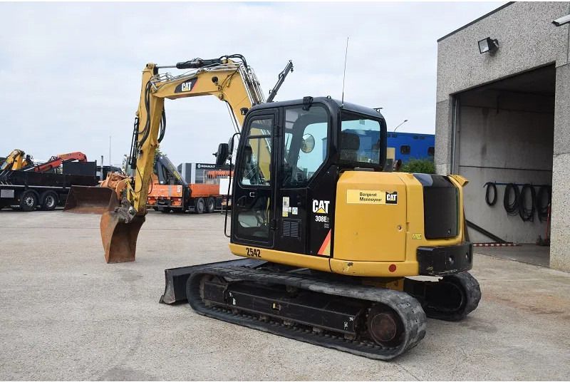 2018 Caterpillar 308E2CR mini excavator, rear three-quarter view 2018 Caterpillar 308E2CR mini excavator, rear three-quarter view
