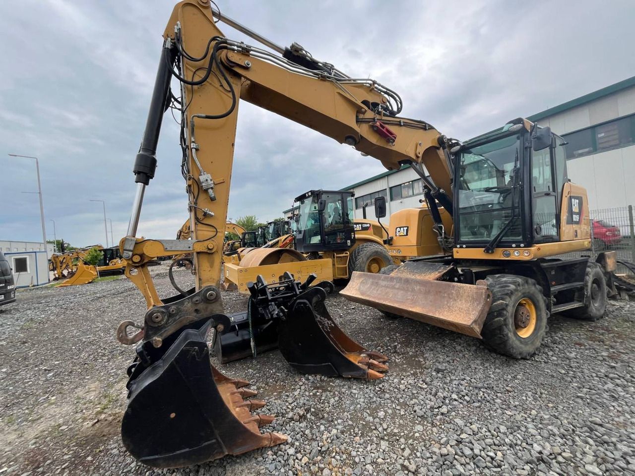 2018 Caterpillar M315F wheel excavator, front three-quarter view 2018 Caterpillar M315F wheel excavator, front three-quarter view
