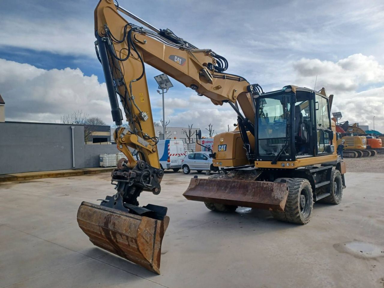 2018 Caterpillar M315F wheel excavator, front three-quarter view 2018 Caterpillar M315F wheel excavator, front three-quarter view