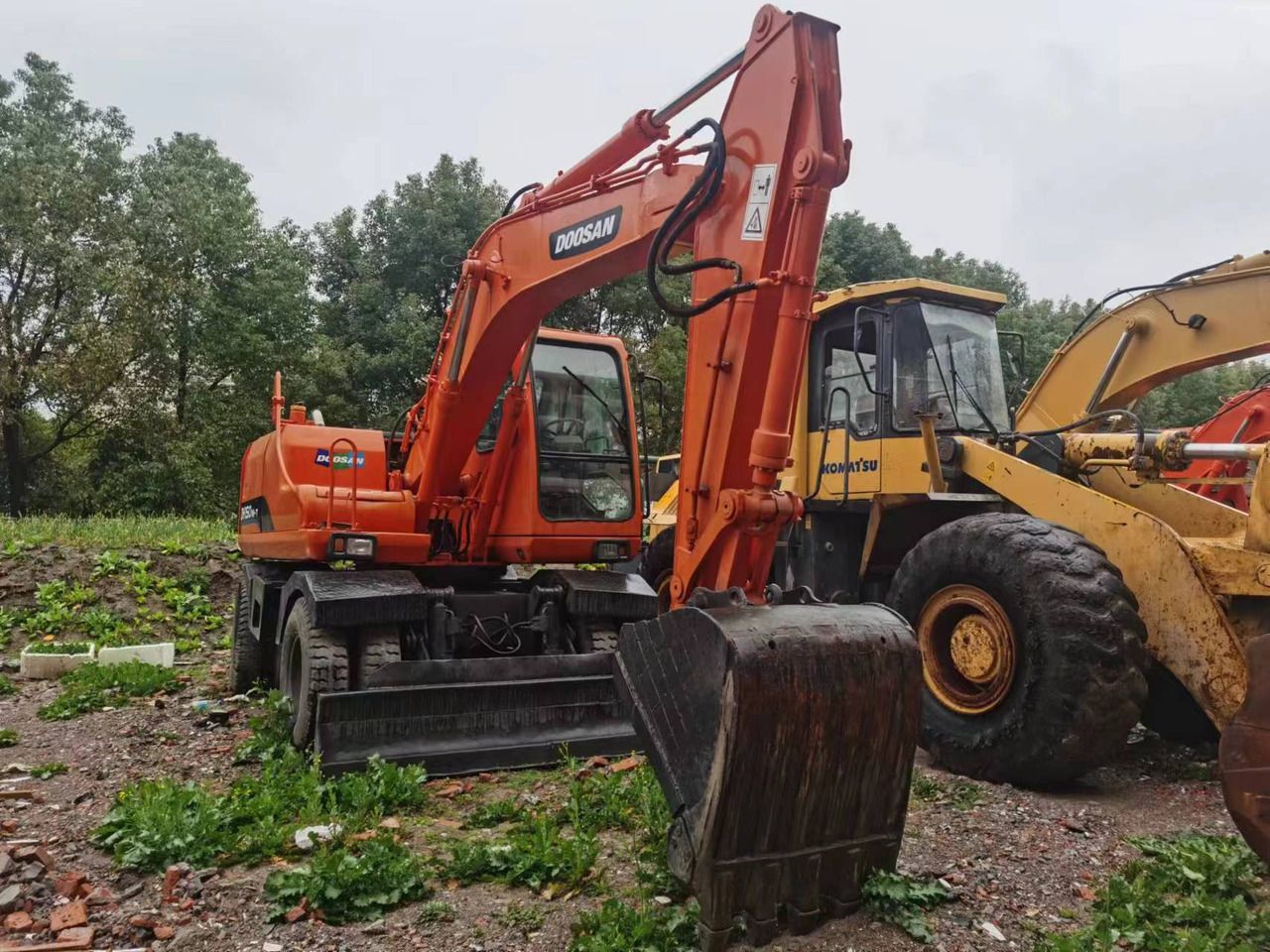 2018 Doosan DH150W-7 wheel excavator, front three-quarter view 2018 Doosan DH150W-7 wheel excavator, front three-quarter view