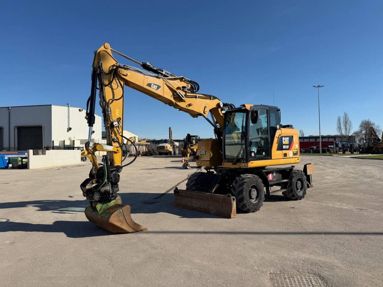 2019 Caterpillar M315F wheel excavator, side profile view 2019 Caterpillar M315F wheel excavator, side profile view