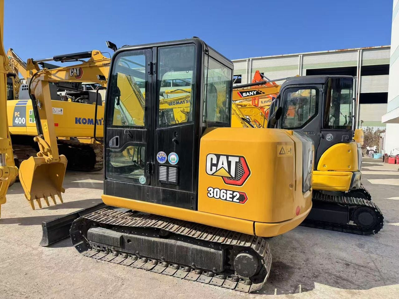 2020 Caterpillar 306E2 mini excavator, rear three-quarter view 2020 Caterpillar 306E2 mini excavator, rear three-quarter view