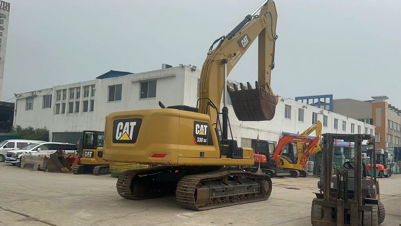 2020 Caterpillar 330GC crawler excavator, rear three-quarter view 2020 Caterpillar 330GC crawler excavator, rear three-quarter view