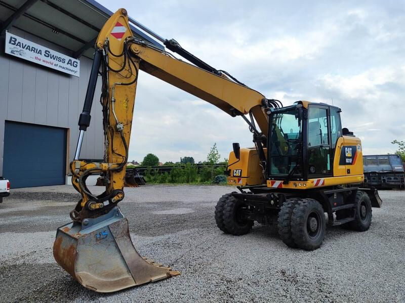 2020 Caterpillar M315F wheel excavator, front three-quarter view