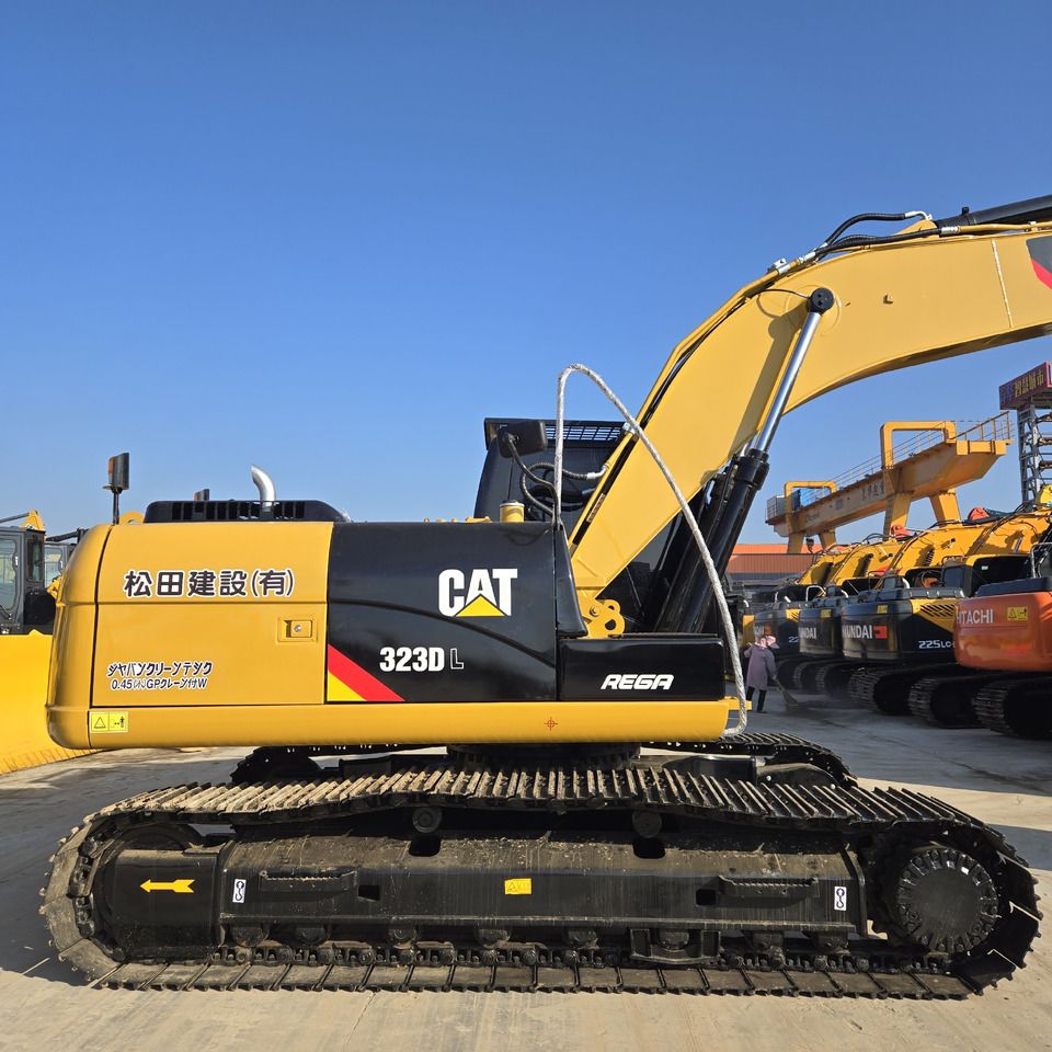 2022 Caterpillar 323DL crawler excavator, side profile view