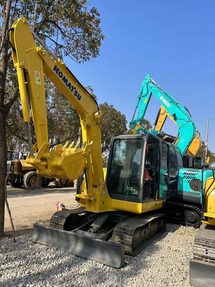 2022 Komatsu 56-7 crawler excavator, front three-quarter view 2022 Komatsu 56-7 crawler excavator, front three-quarter view